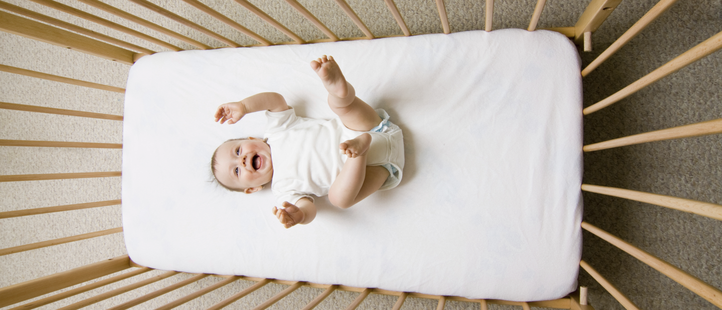 Baby in ledikant