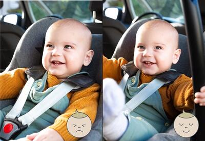 Baby in autostoel met draagbeugel omhoog